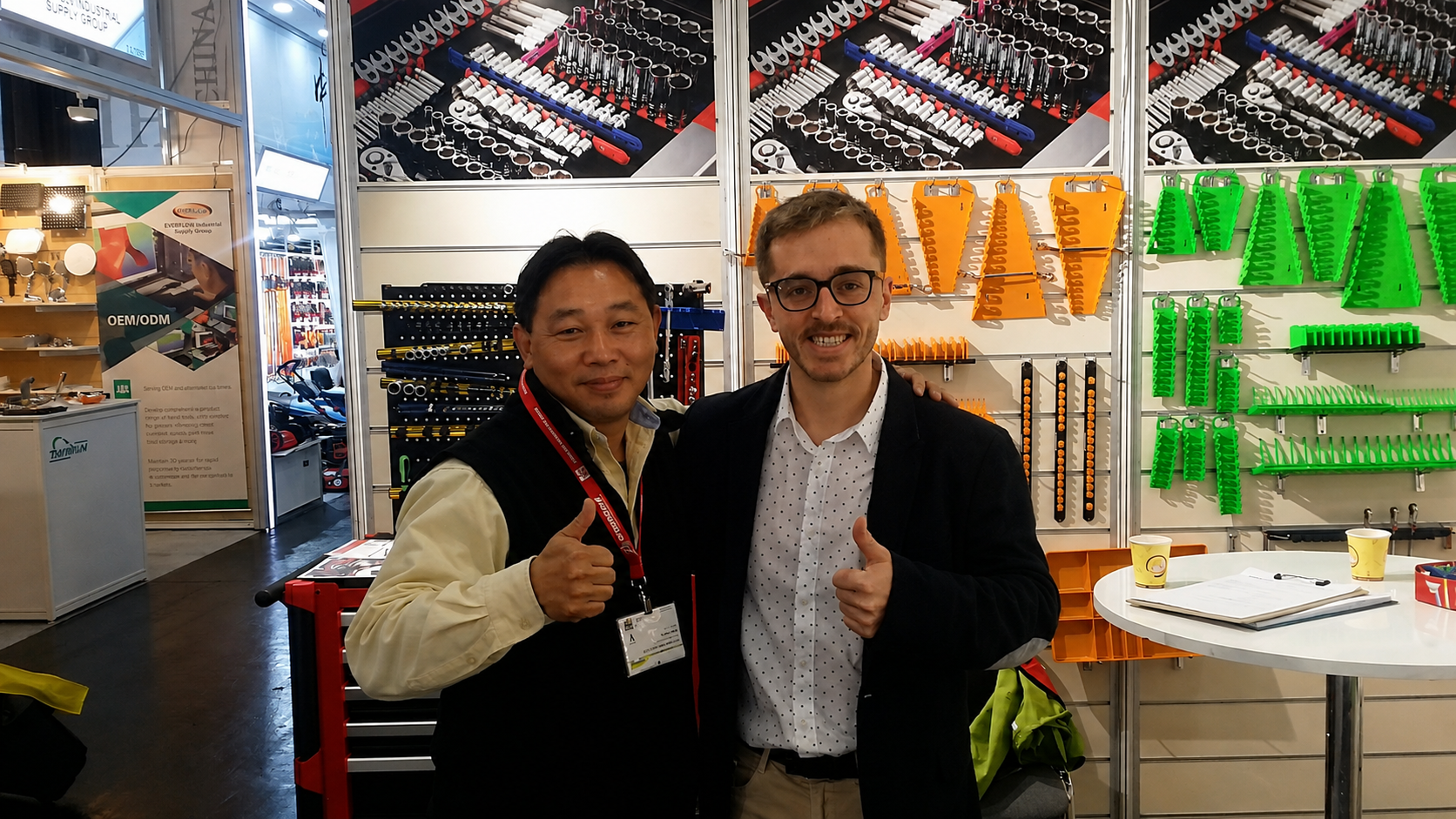 Two tool-industry professionals meeting at an international exhibition